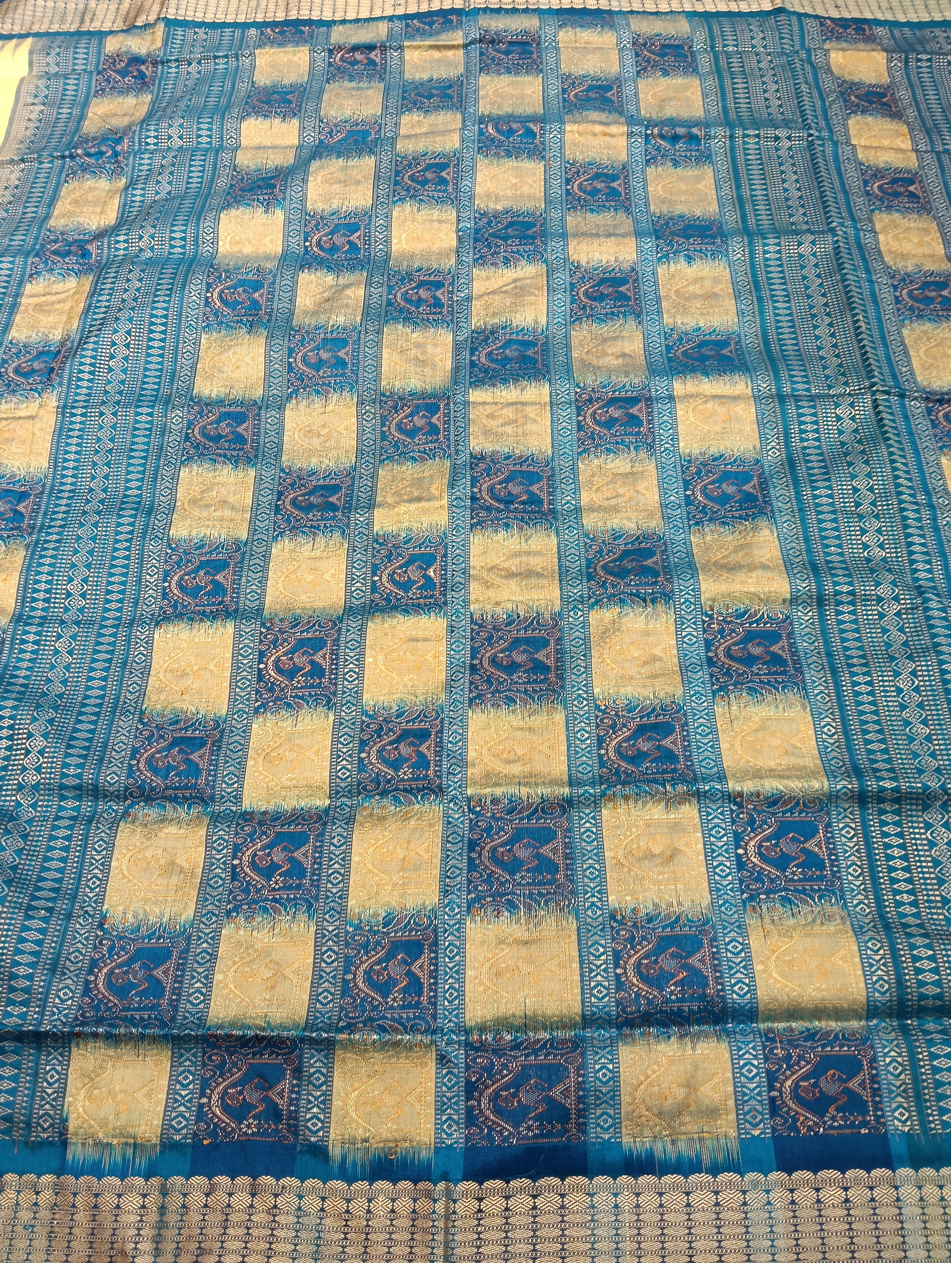 Cream sky sambalpuri silk patta saree - Tilottama